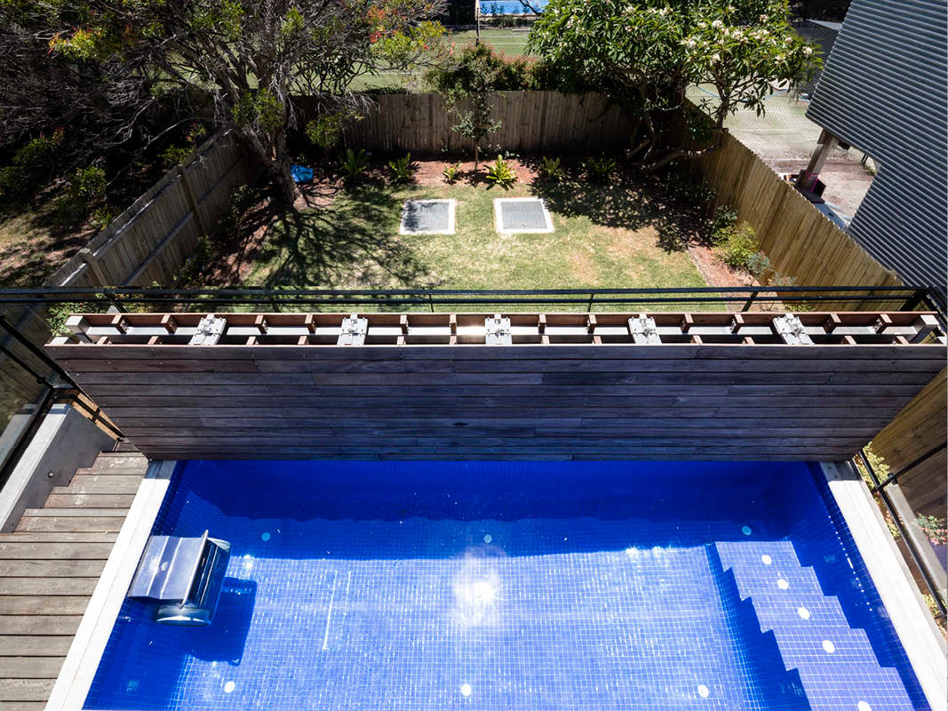 Industrial-Design-Tilt-Retractable-pool-deck-Custom-Pool-Cover-Architetcural-pool-deck