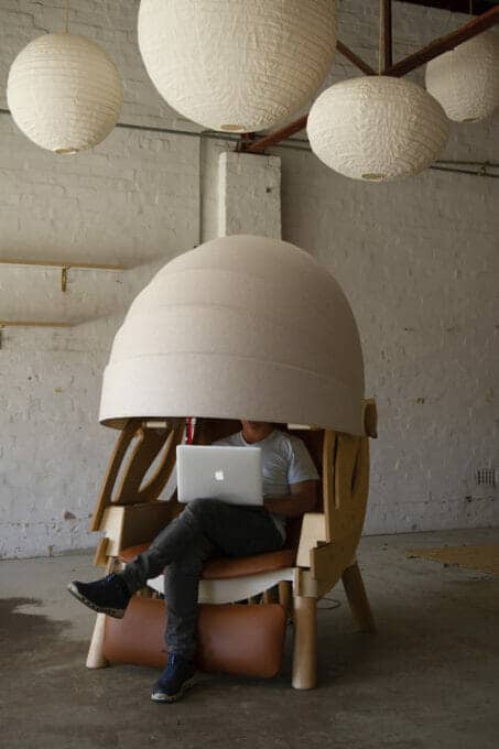 Q-Pod-Man-Working-In-Chair-Quiet-Space-Intelligent-Furniture-Design