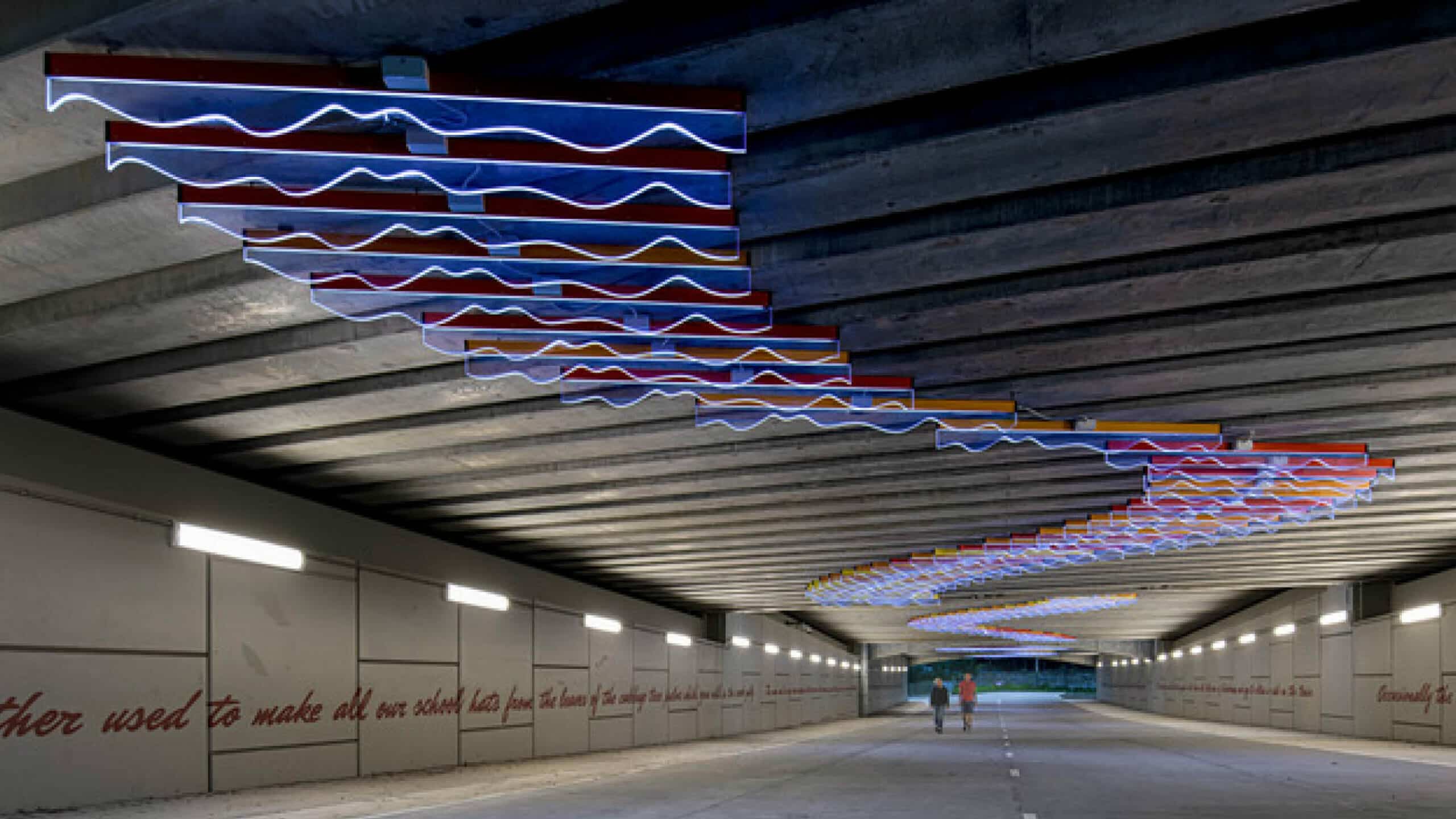 Wolli Sculptural Lighting Installation Rippled Waves Suspended Top of Tunnel